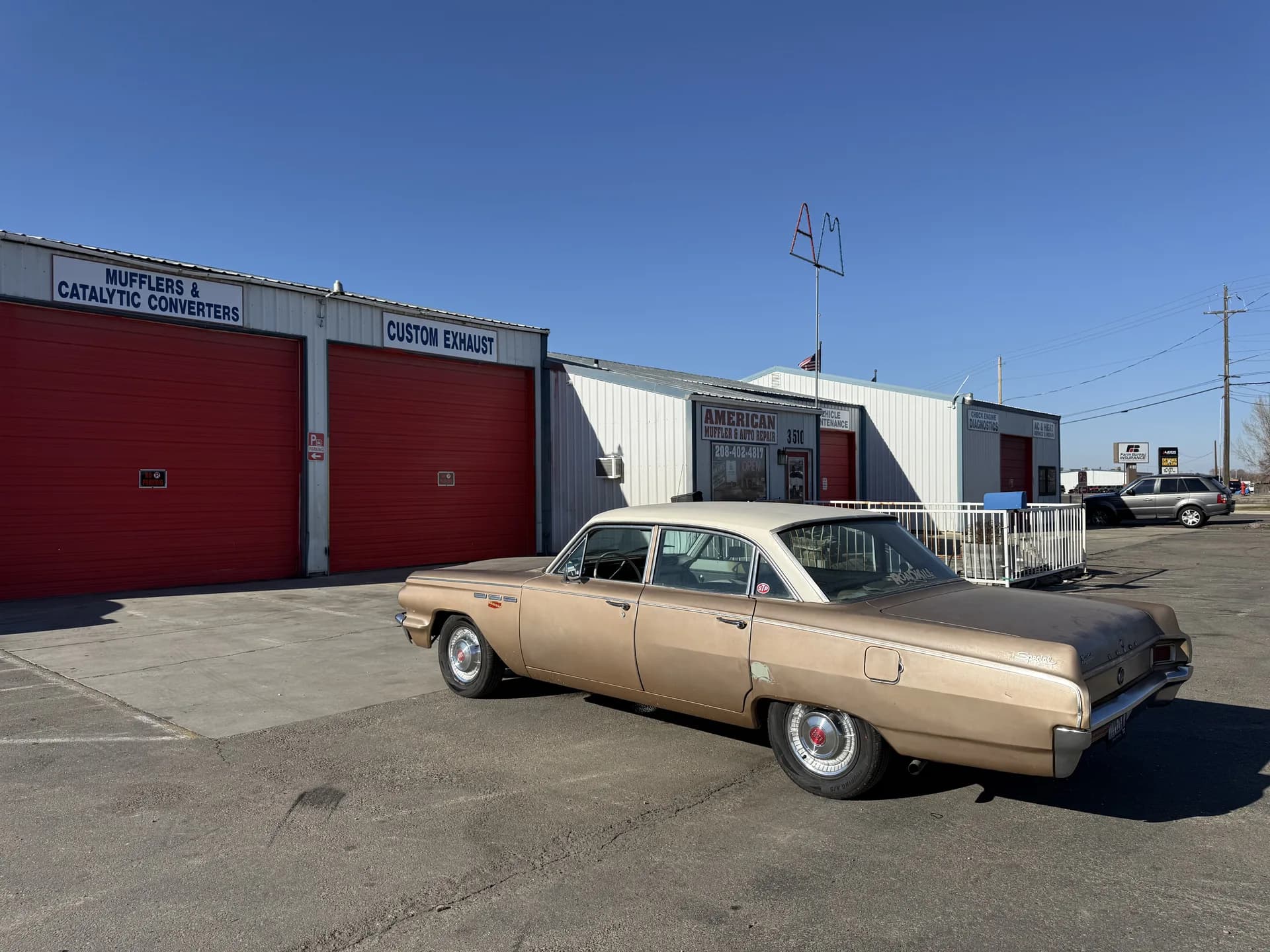 auto repair shop garage bays and muffler repair facility