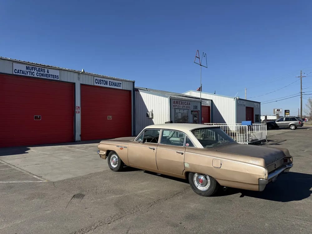 auto repair shop garage bays and muffler repair facility