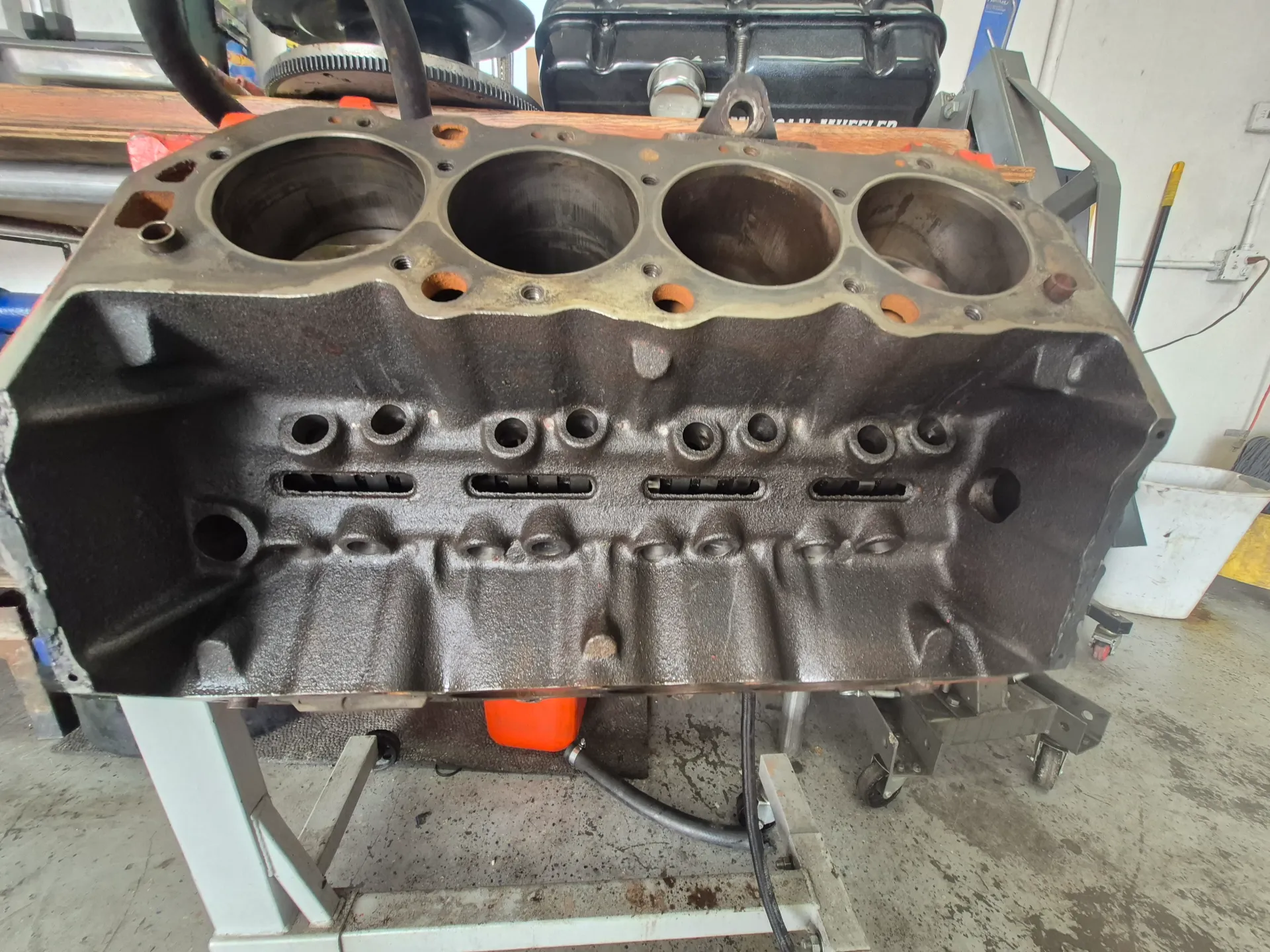 engine cylinder head rebuilding on shop work stand