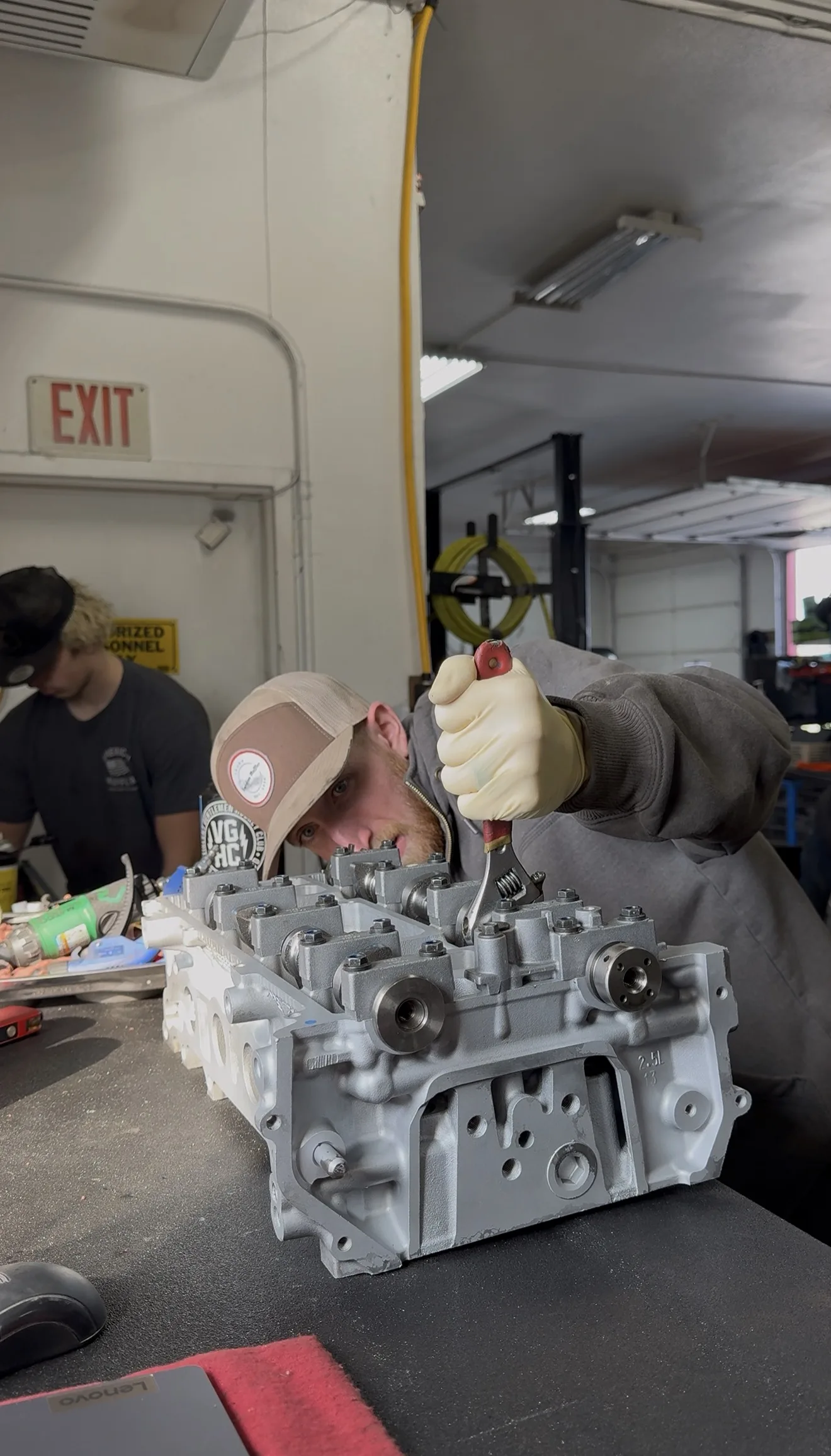 engine rebuilding cylinder head repair on workbench