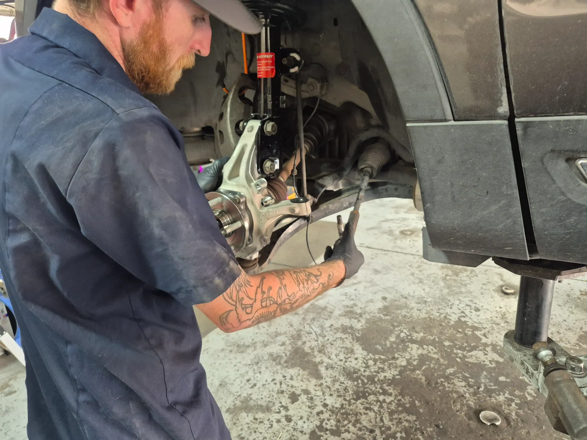 front suspension and steering repair under vehicle