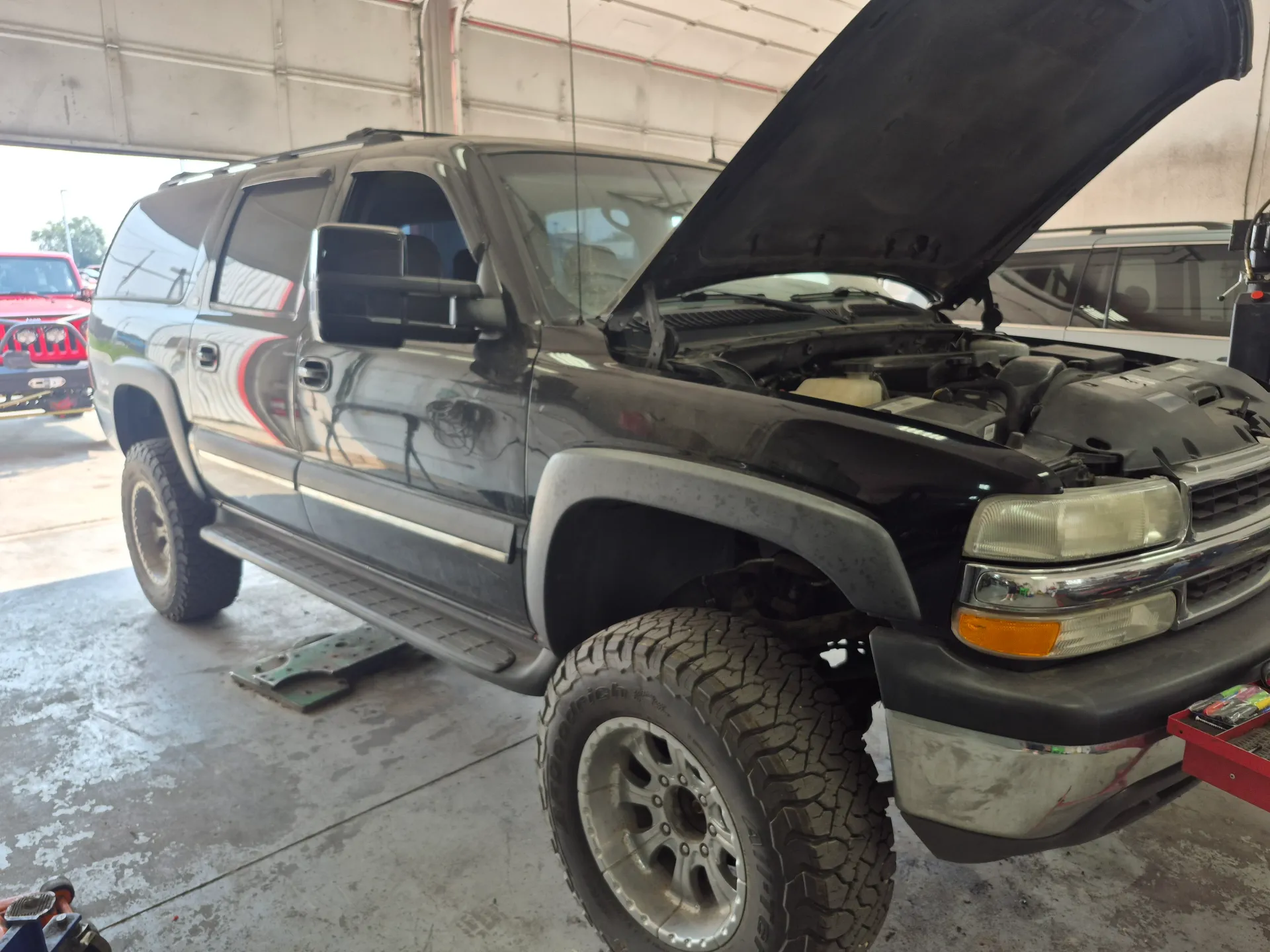 suv engine repair and diagnostics with hood open