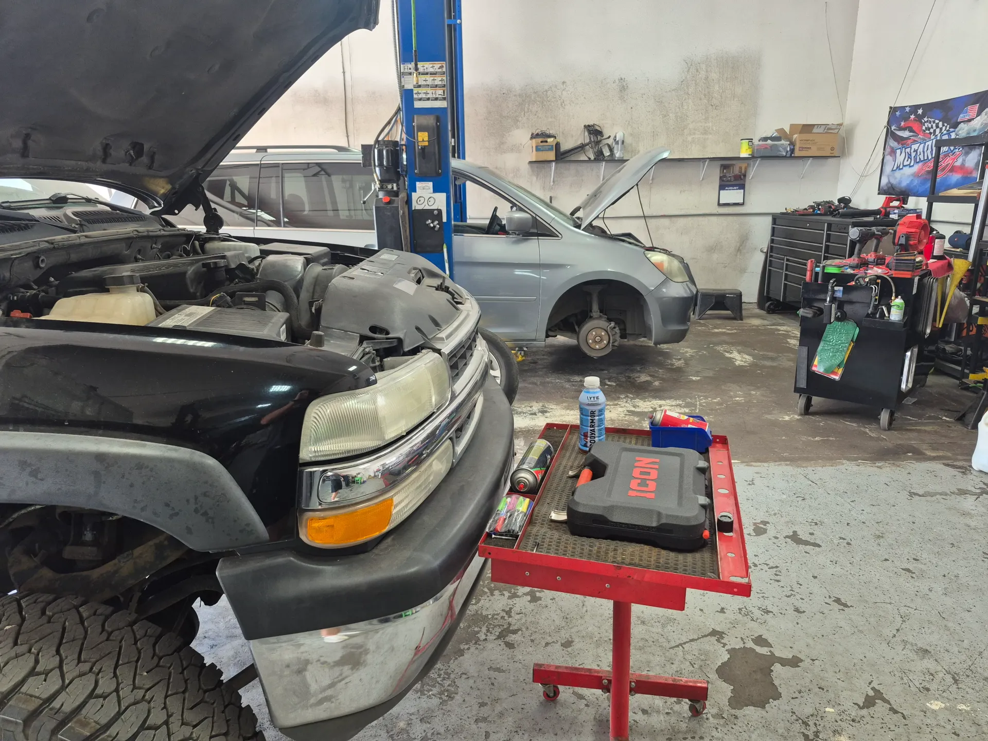 truck engine diagnostics with scan tool in repair bay