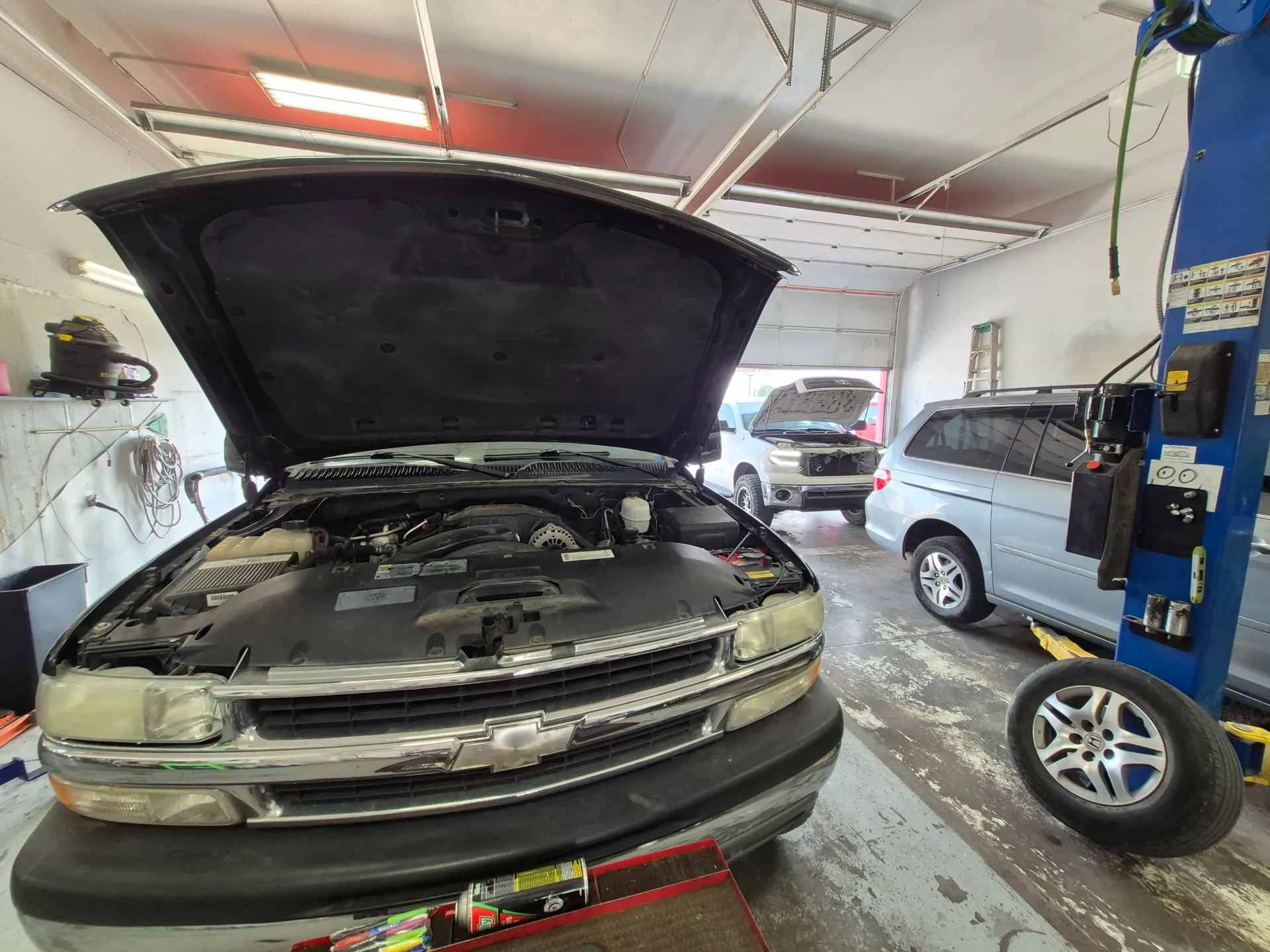 truck engine service in full auto repair shop
